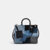 Rogue-tassen met patchwork van hergebruikt denim