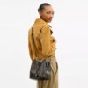 Rowan-bucketbag van Loved Signature Canvas met bedels