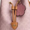 Rowan-bucketbag van Signature Canvas met bedels