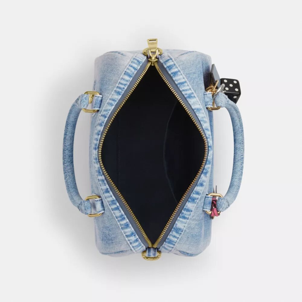 Rowan-satcheltas in 'Loved Denim' met bedels