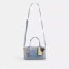 Rowan-satcheltas in 'Loved Denim' met bedels