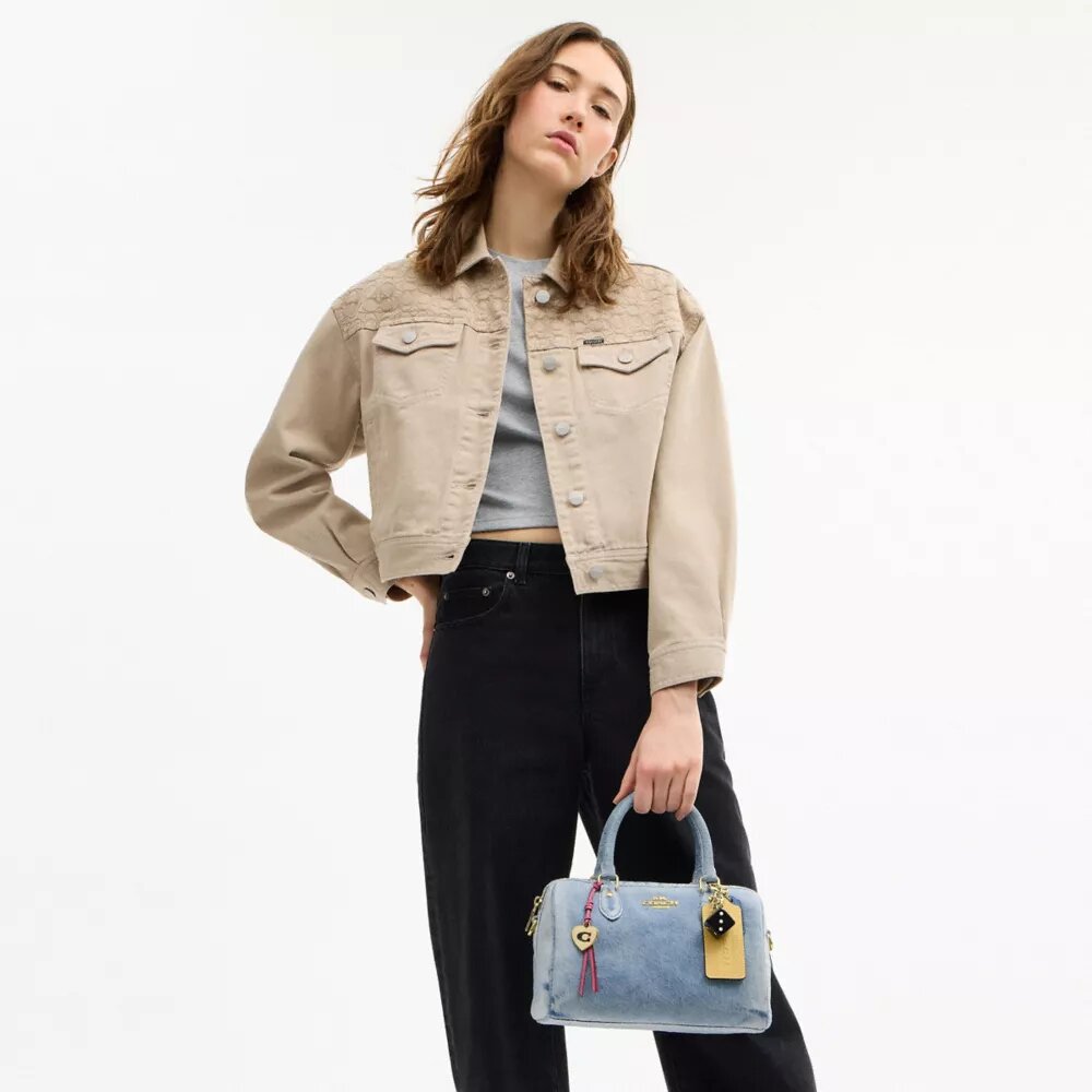 Rowan-satcheltas in 'Loved Denim' met bedels