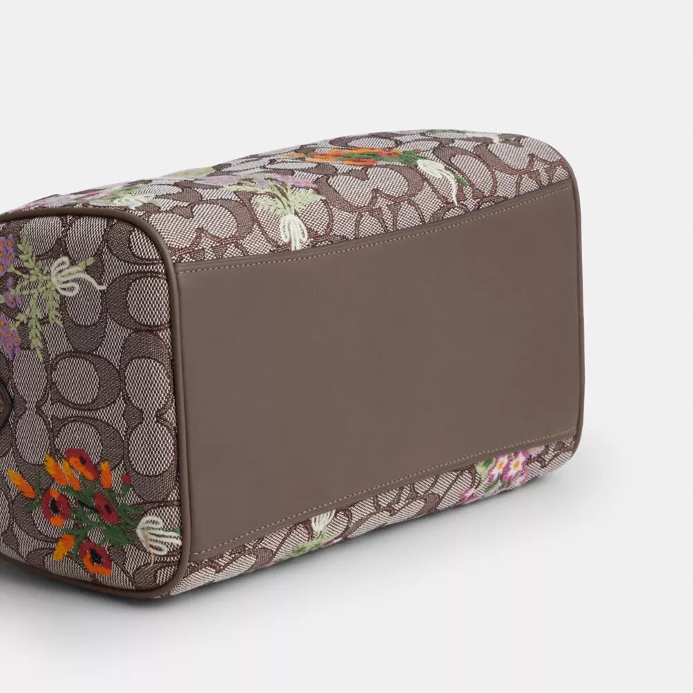 Rowan-satcheltassen in kenmerkend jacquard met bloemenborduursel