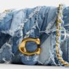 Tabby-schoudertas 26 met patchwork-quiltpatroon van hergebruikt denim