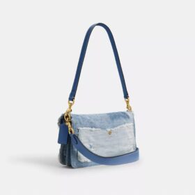 Tabby-schoudertas 26 met patchwork van hergebruikt denim