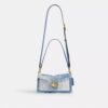 Tabby-schoudertas 26 met patchwork van hergebruikt denim