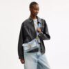 Tabby-schoudertas 26 met patchwork van hergebruikt denim