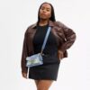Tabby-schoudertas 26 met patchwork van hergebruikt denim
