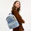 Taylor kleine rugzak in Loved Denim