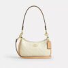 Teri Mini-crossbodytas van kenmerkend leer