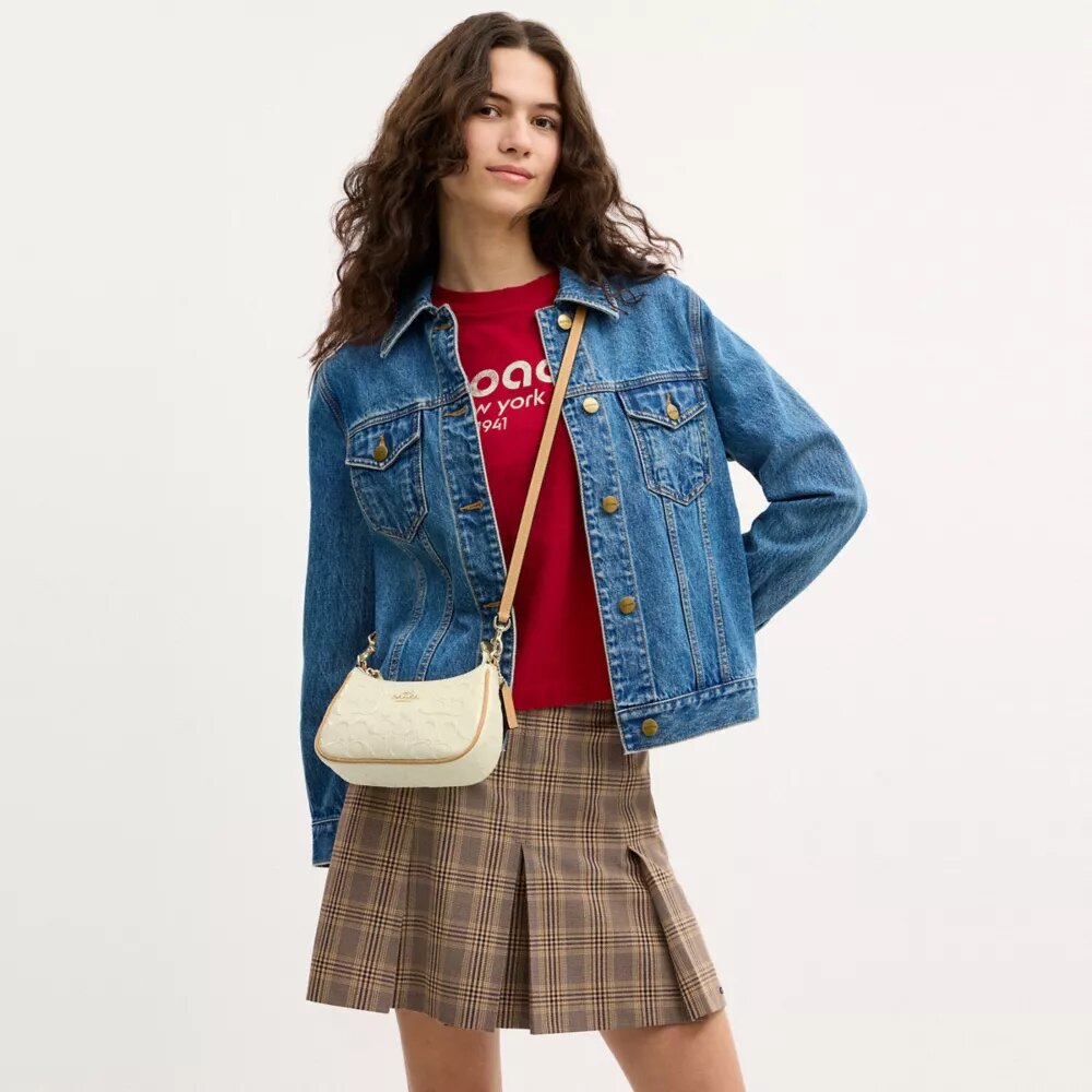 Teri Mini-crossbodytas van kenmerkend leer