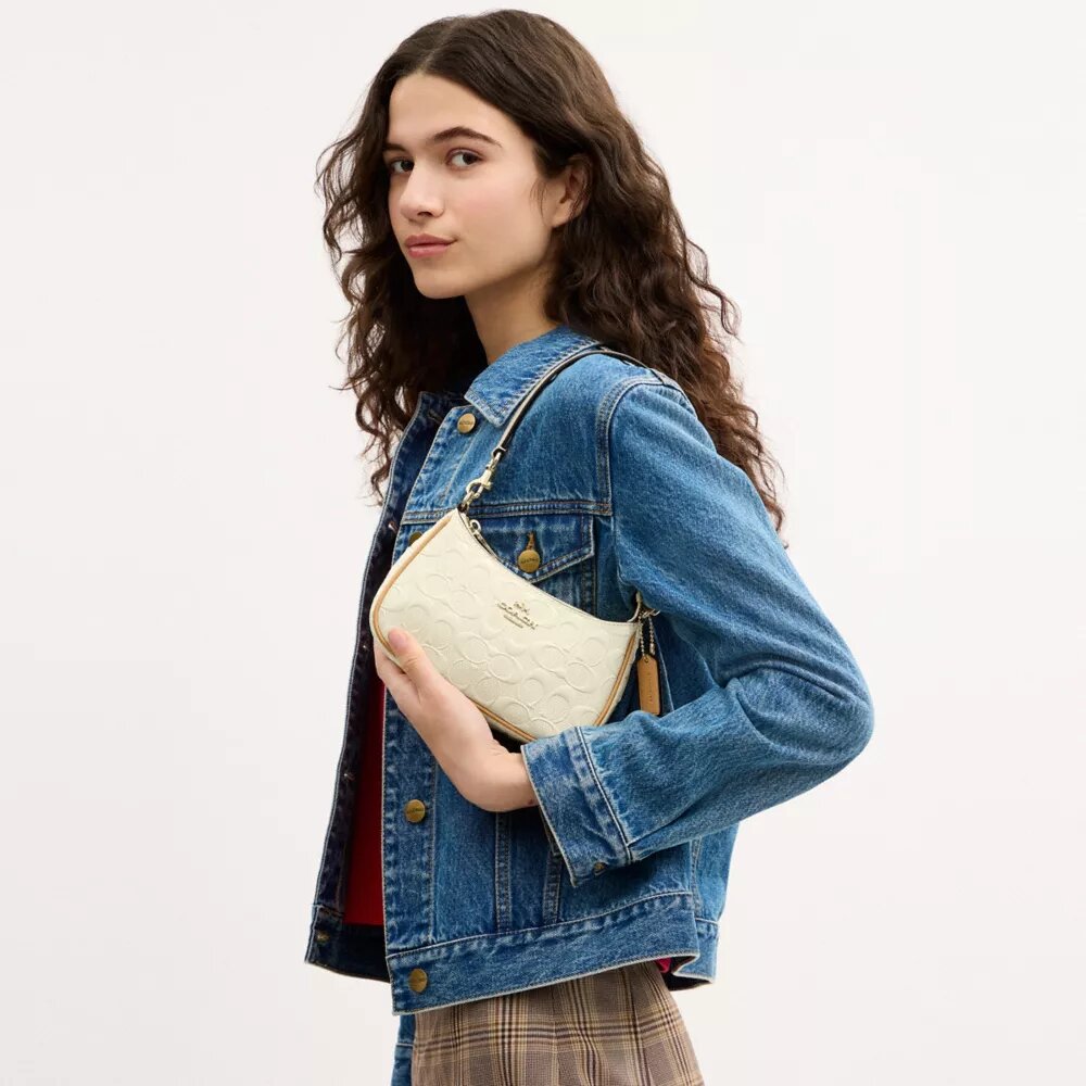 Teri Mini-crossbodytas van kenmerkend leer