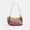 Teri Mini-crossbodytas van Signature Canvas
