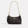 Teri Mini-crossbodytas van Signature Canvas