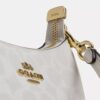 Teri Mini-crossbodytas van Signature Canvas