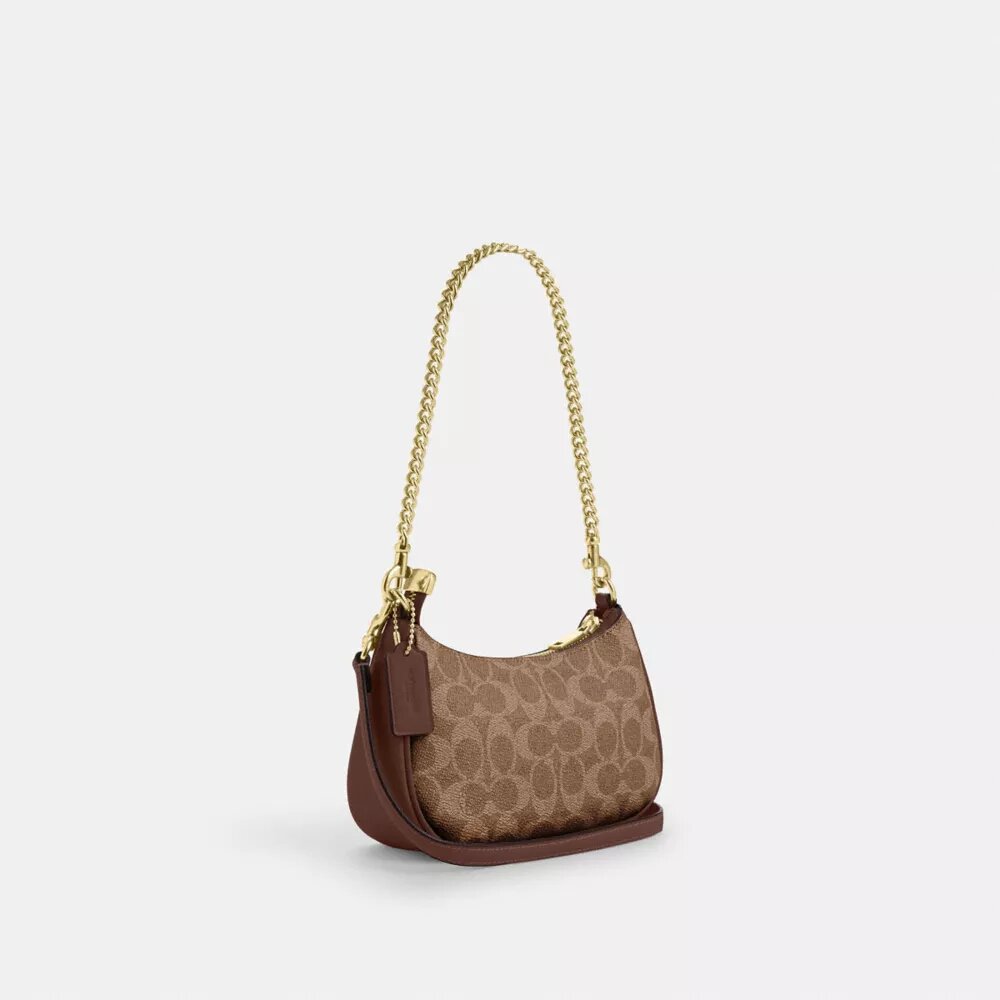 Teri Mini-crossbodytas van Signature Canvas