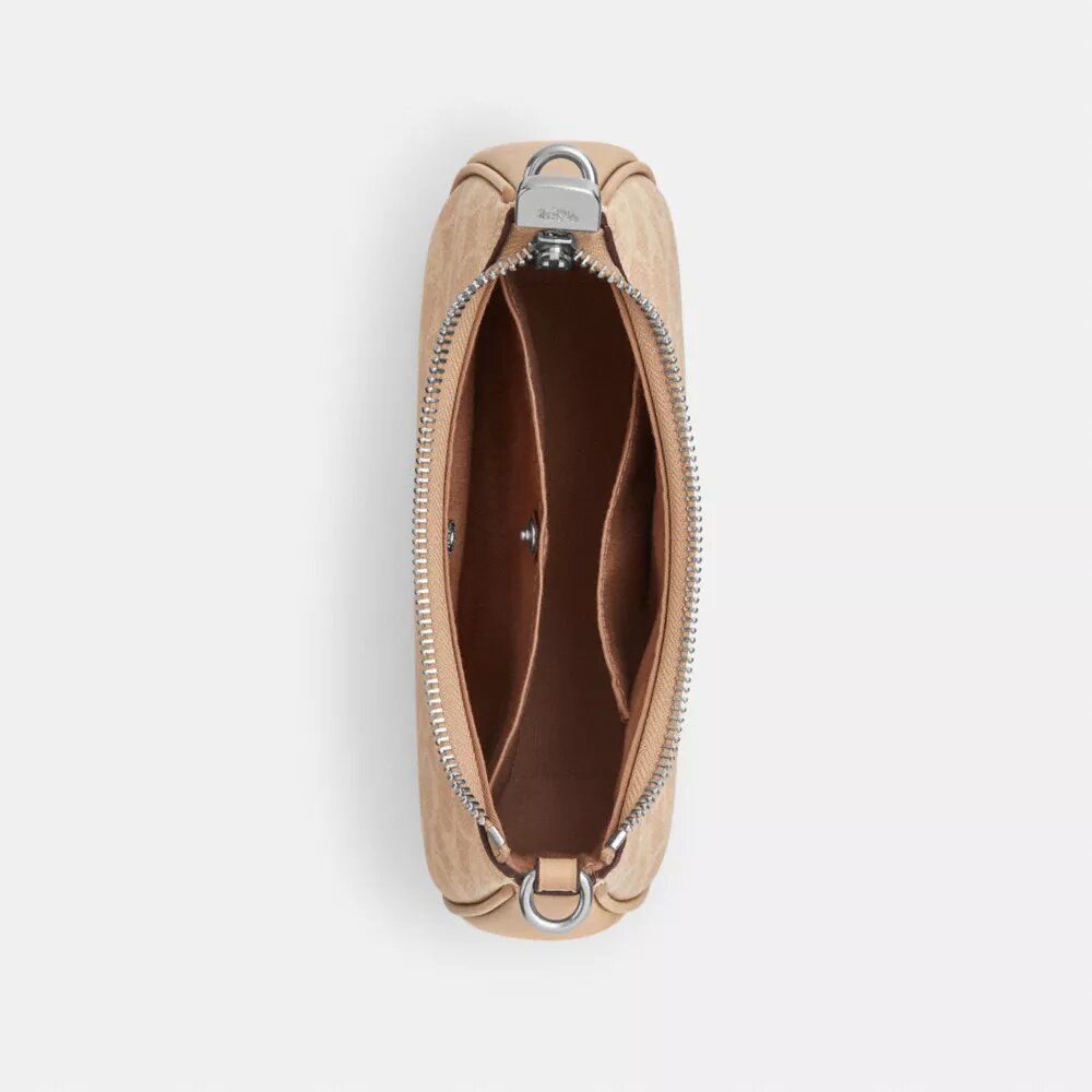Teri Mini-crossbodytas van Signature Canvas
