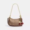 Teri Mini-crossbodytas van Signature Canvas