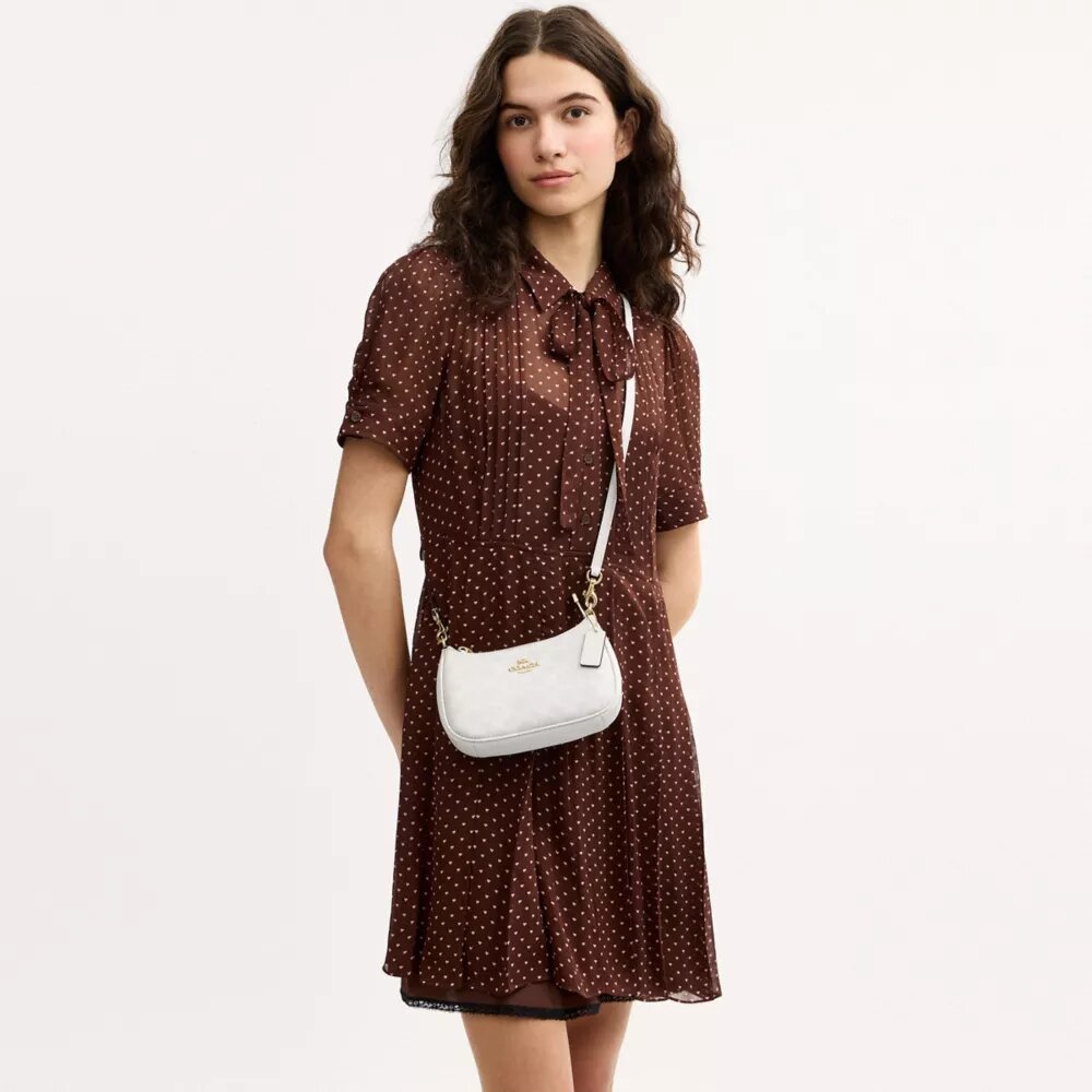 Teri Mini-crossbodytas van Signature Canvas