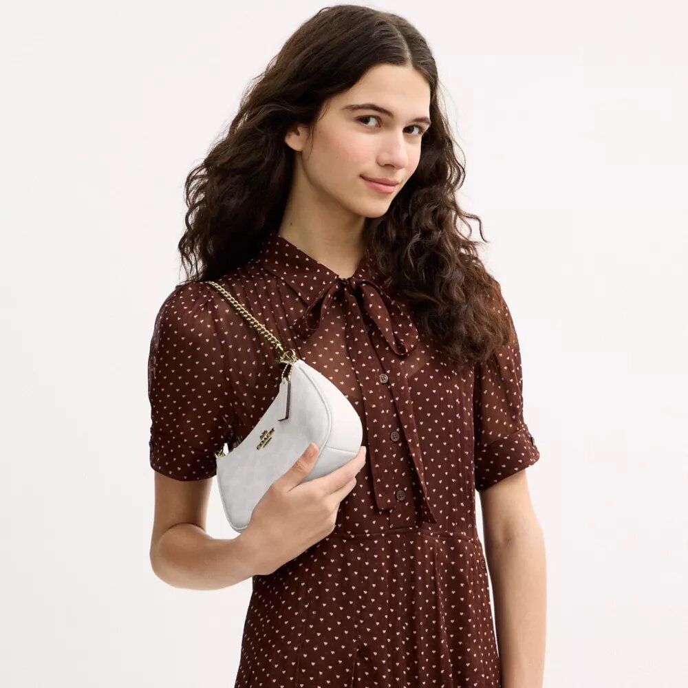 Teri Mini-crossbodytas van Signature Canvas
