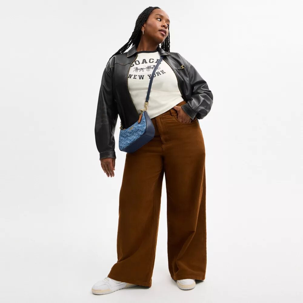Teri-schoudertas in kenmerkend denim