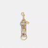 Trigger Snap-tashanger met schelpenprint