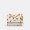 Trigger Snap-tashanger met schelpenprint
