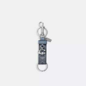 Trigger-tashanger met drukknoop in Signature Canvas met bedel