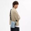 Tristan-crossbodytas 14 in geliefd Signature-denim met bedels