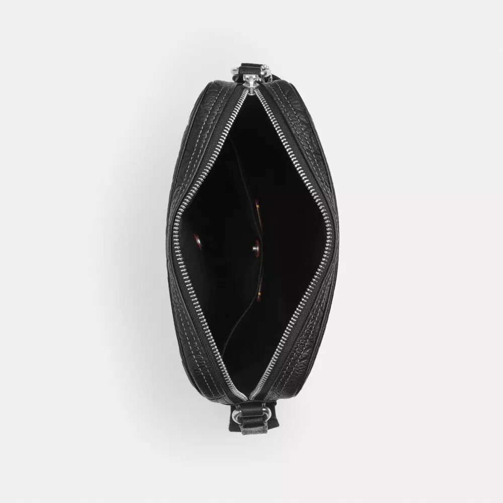 Tristan-crossbodytas 22 in kenmerkend leer