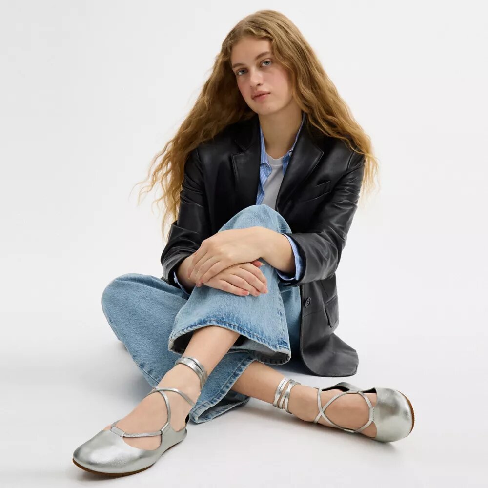 Zachte ballerina's met vetersluiting